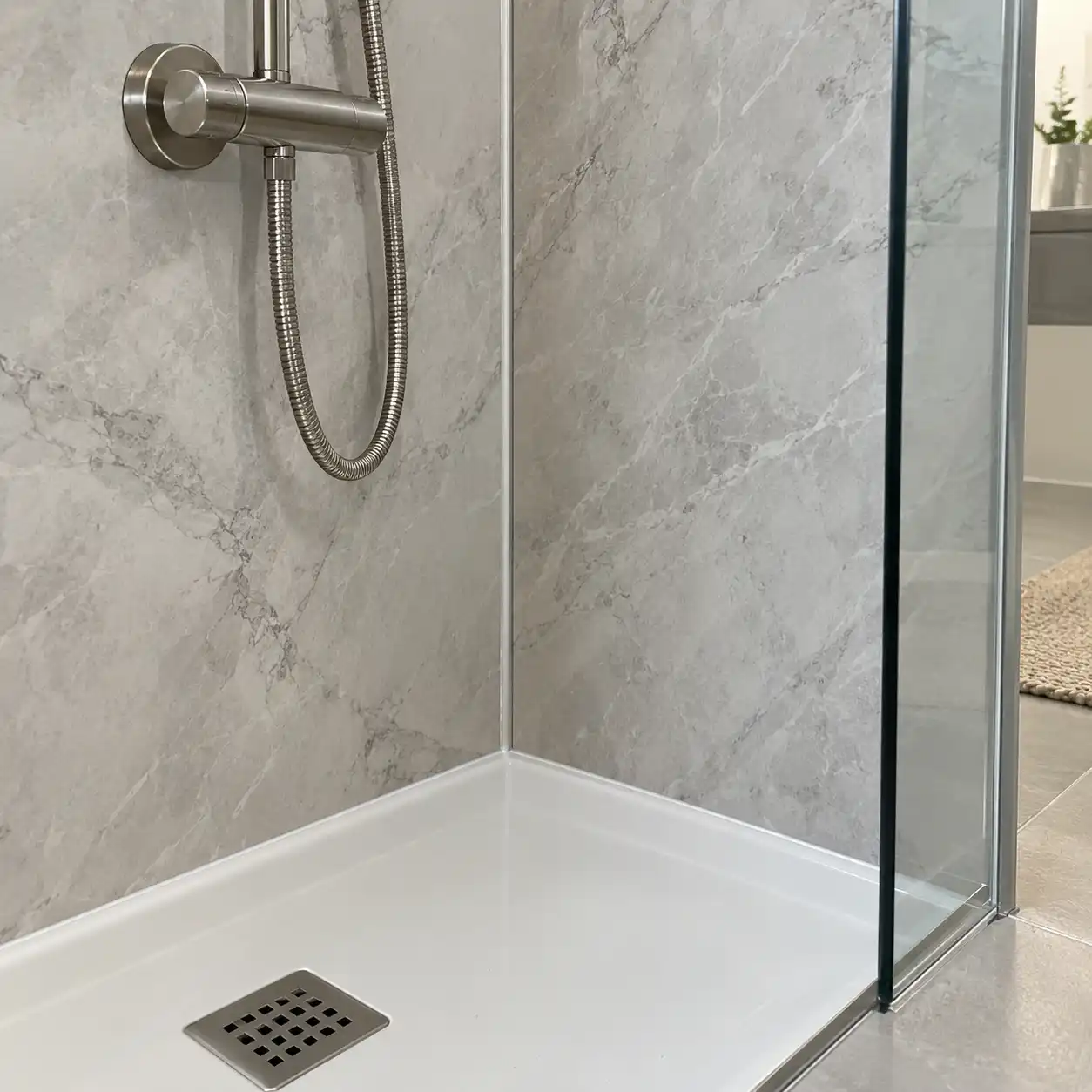 SPC shower wall panel pipe cut-out, corner and sealant detail for wet areas